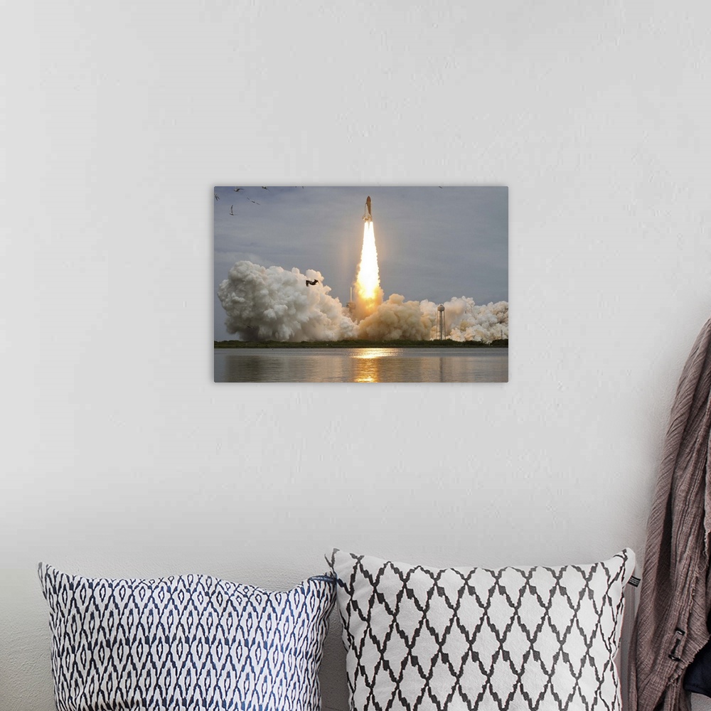 A bohemian room featuring July 8, 2011 - Space shuttle Atlantis is seen as it launches from pad 39A at the Kennedy Space Ce...
