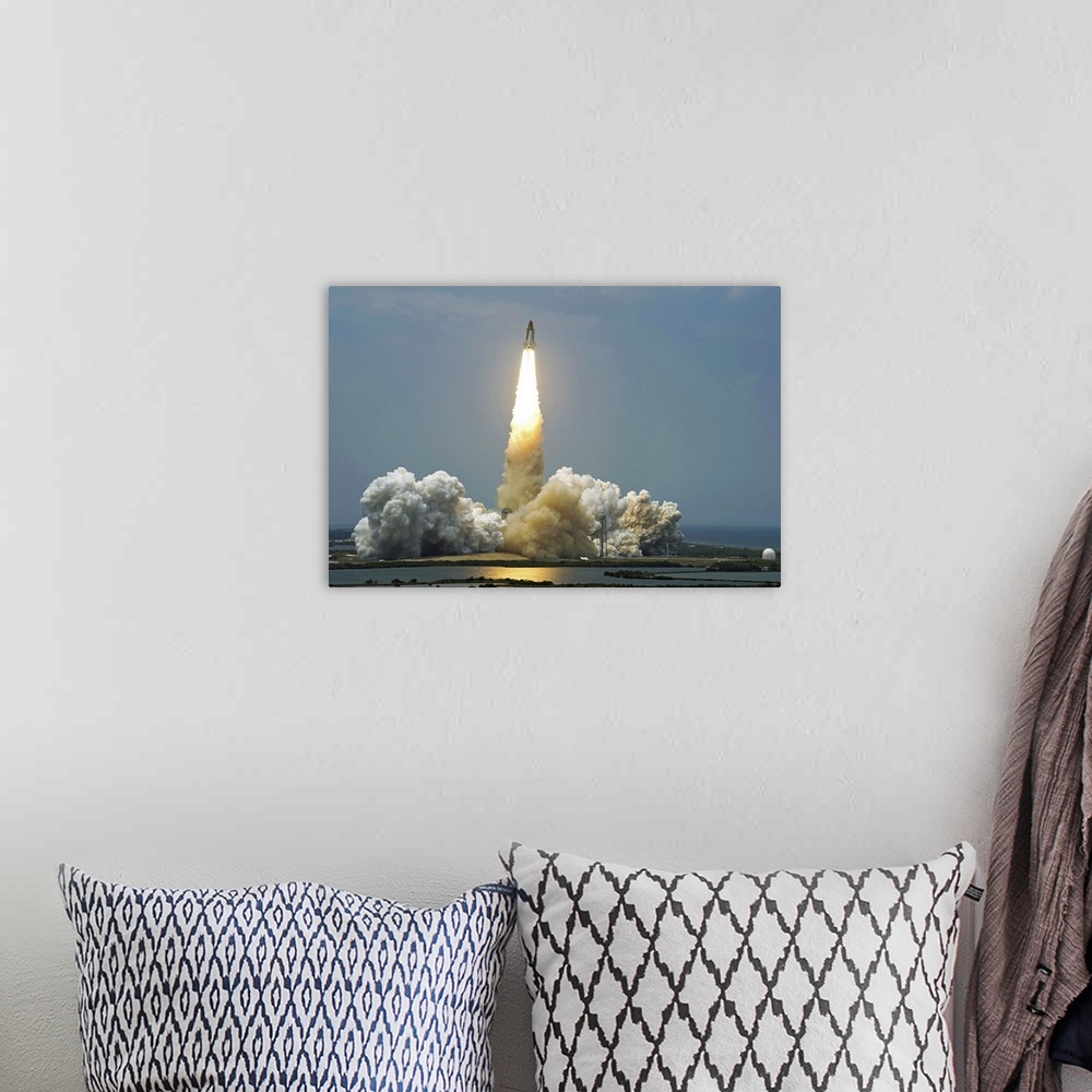 A bohemian room featuring Space Shuttle Atlantis lifts off into the sky