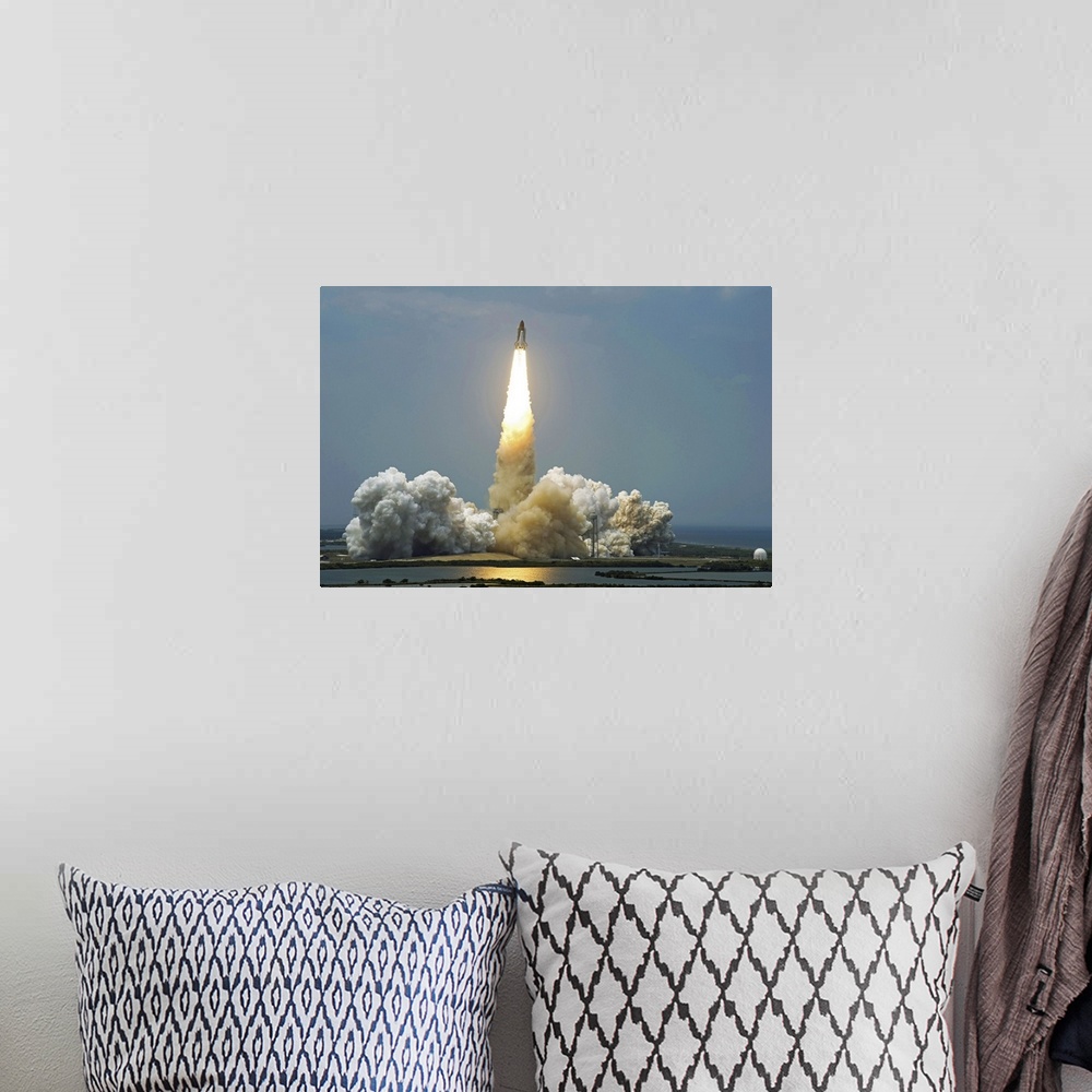 A bohemian room featuring Space Shuttle Atlantis lifts off into the sky