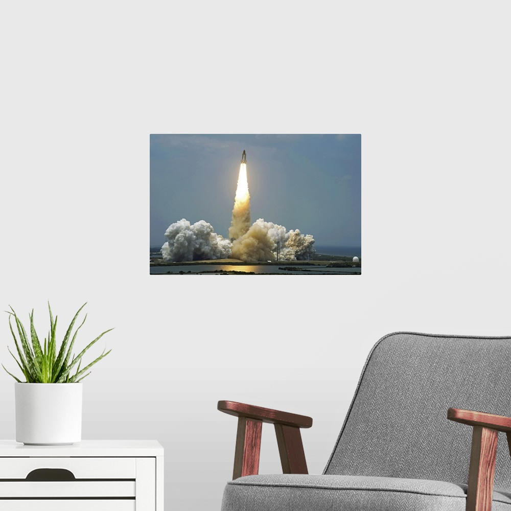 A modern room featuring Space Shuttle Atlantis lifts off into the sky
