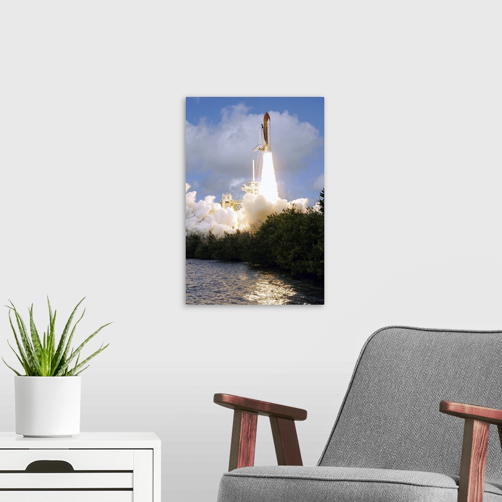 A modern room featuring Space Shuttle Discovery launch