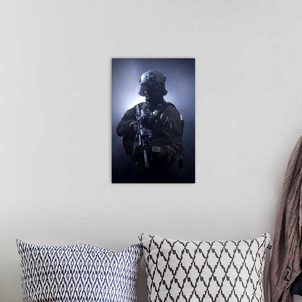 A bohemian room featuring Special operations forces soldier equipped with night vision and an automatic weapon.