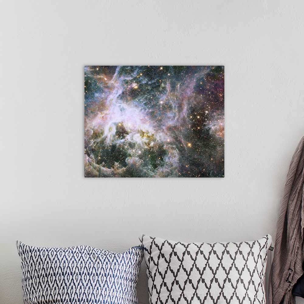 A bohemian room featuring This Hubble Space Telescope mosaic, spanning a width of 600 light-years, shows a star factory of ...