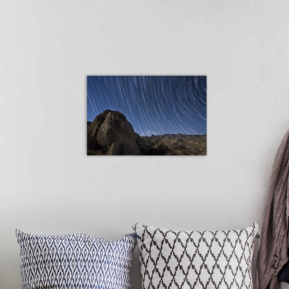 A bohemian room featuring Star trails above the San Ysidro Mountains in Anza Borrego Desert State Park, California.