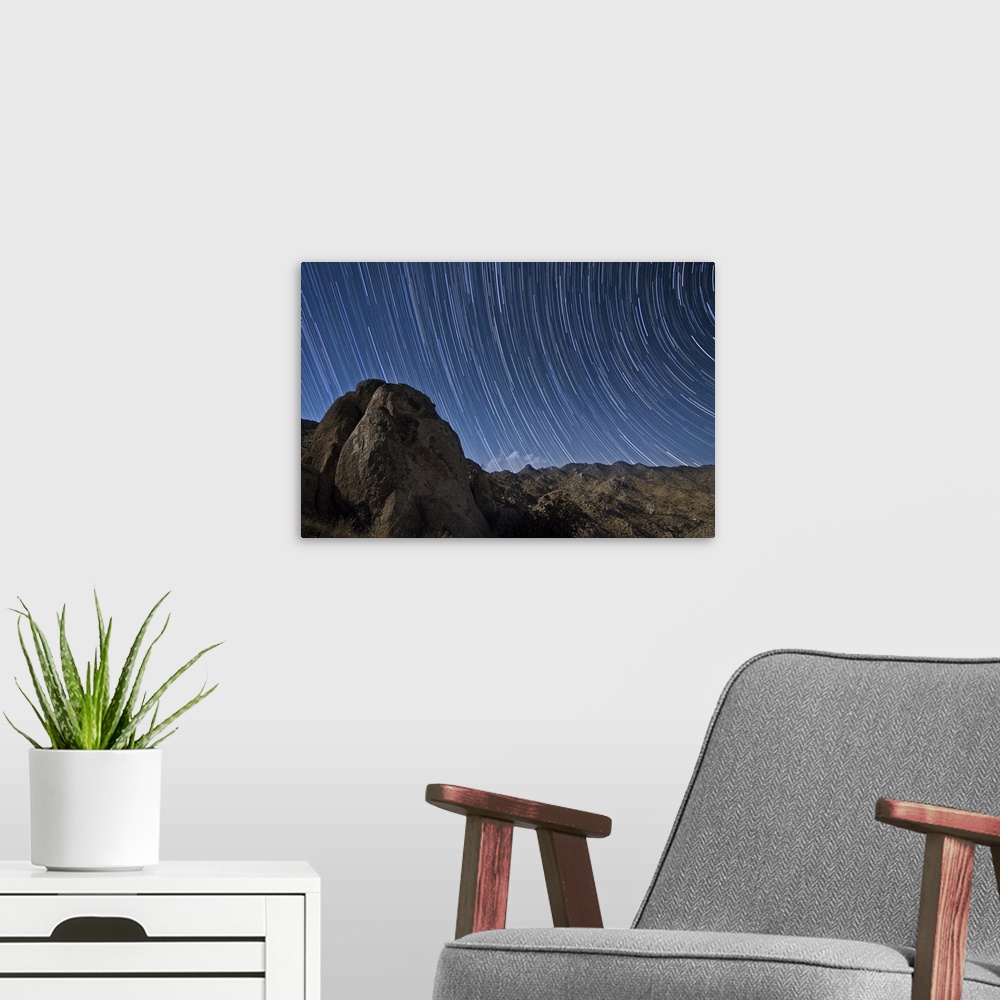 A modern room featuring Star trails above the San Ysidro Mountains in Anza Borrego Desert State Park, California.