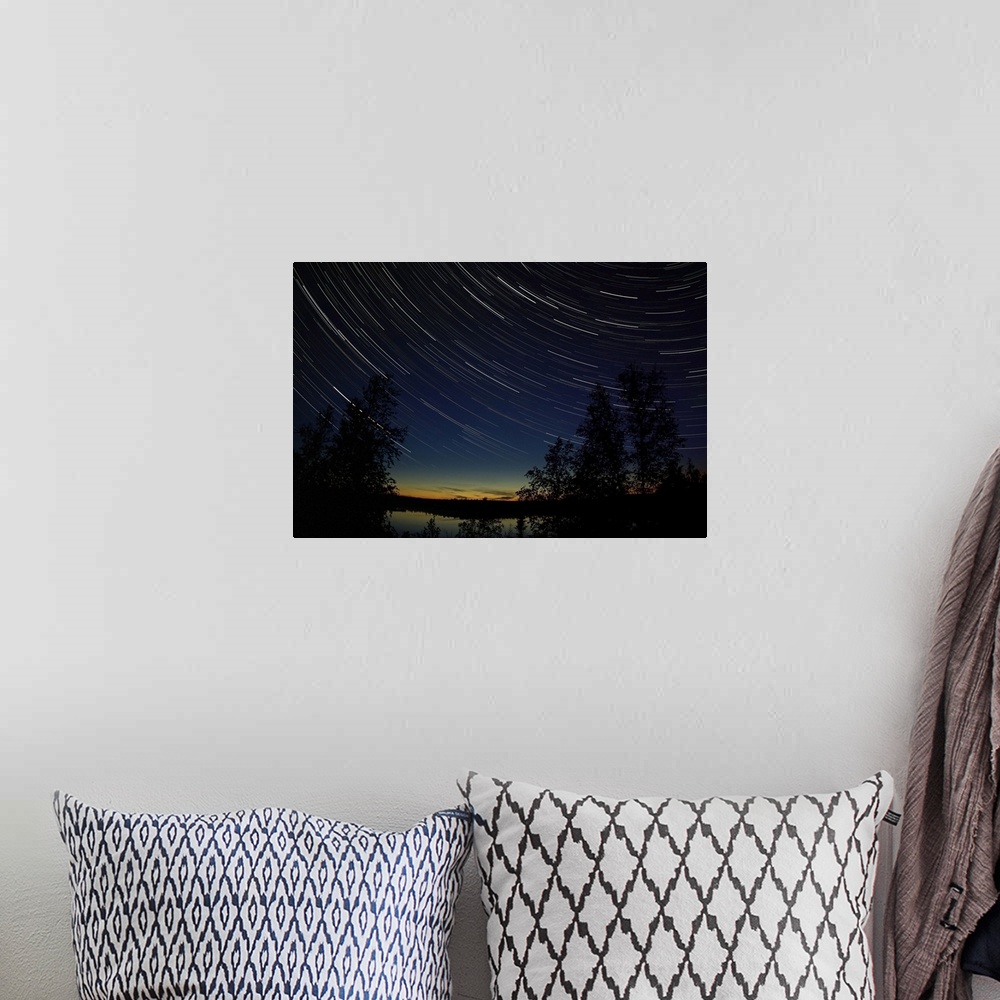 A bohemian room featuring Star trails at dusk