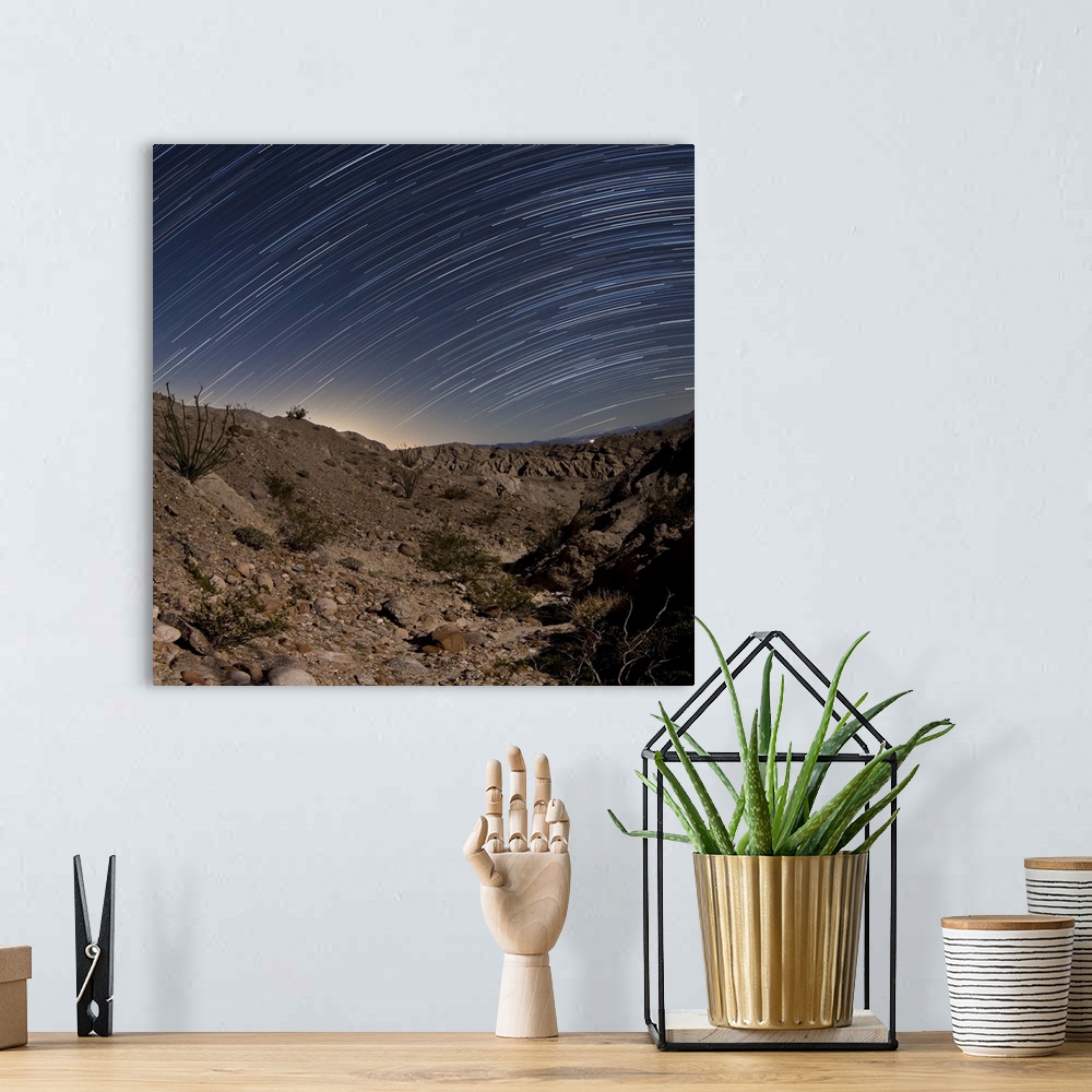 A bohemian room featuring Star trails over one of the many rugged canyons in the Santa Rosa Mountains. Anza Borrego Desert ...