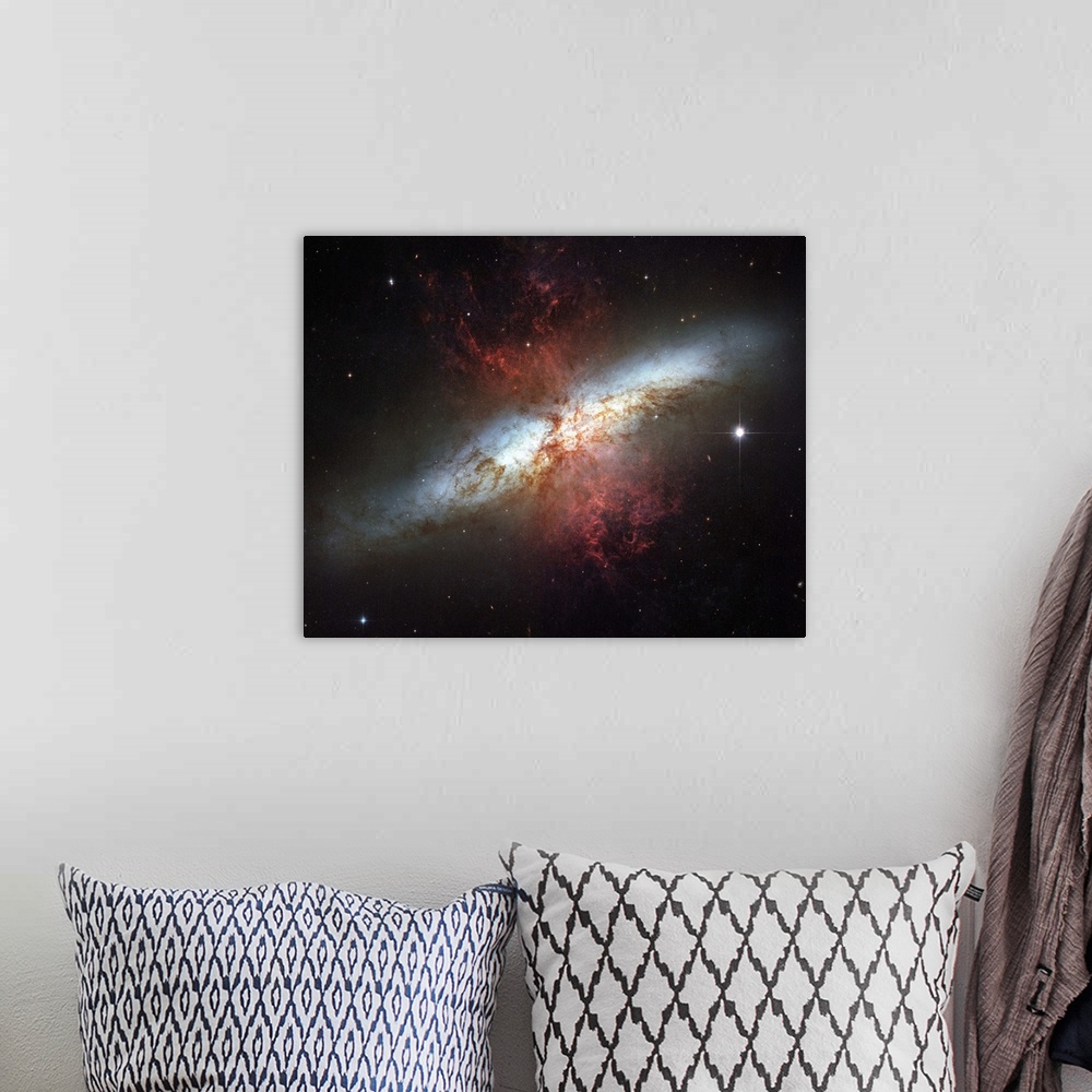 A bohemian room featuring Starburst galaxy Messier 82