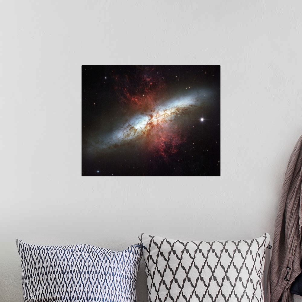 A bohemian room featuring Starburst galaxy Messier 82
