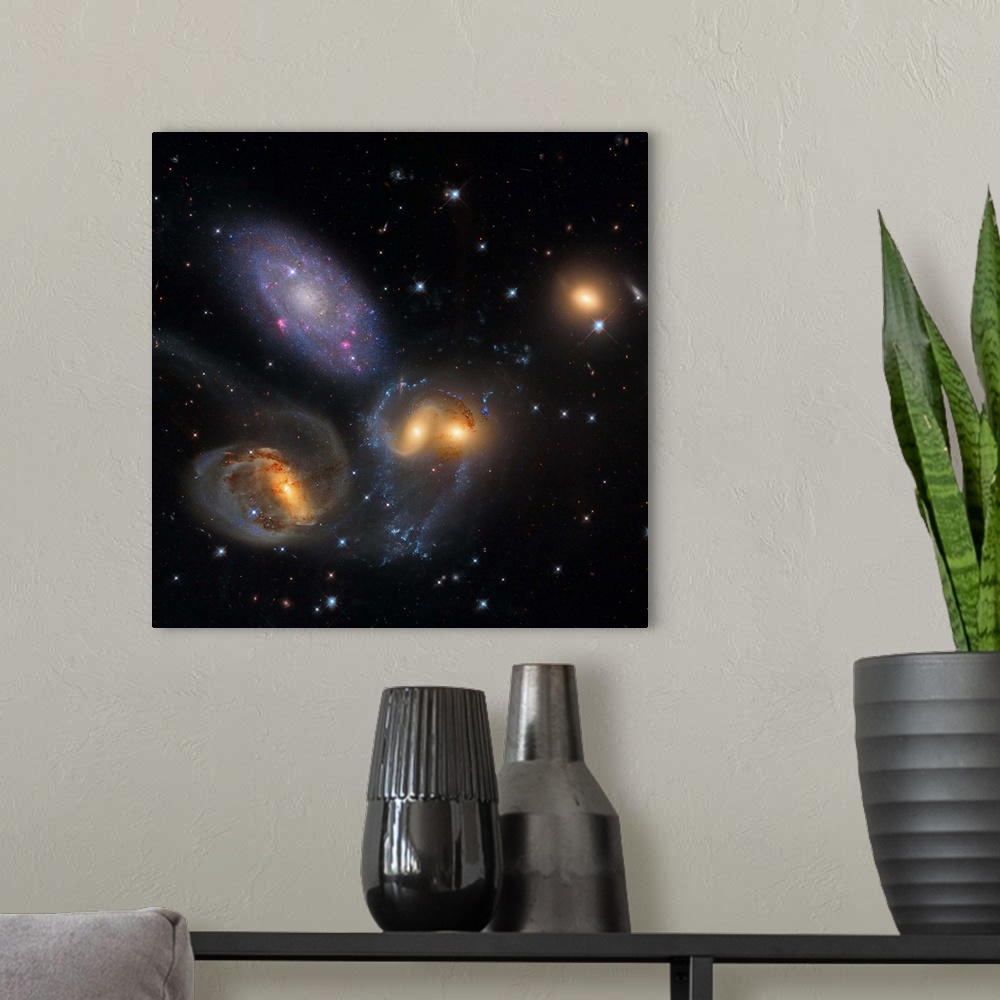 A modern room featuring Stephan's Quintet, a grouping of galaxies in the constellation Pegasus.