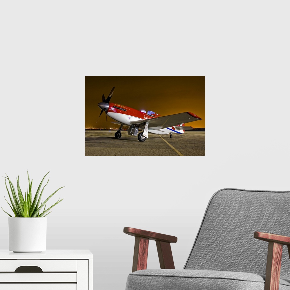 A modern room featuring Strega, a highly modified P-51D Mustang racer, at Chino, California.