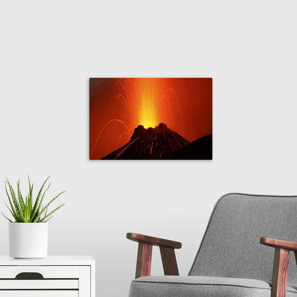 A modern room featuring Photograph of an erupting volcano on the Aeolian Islands in Italy.