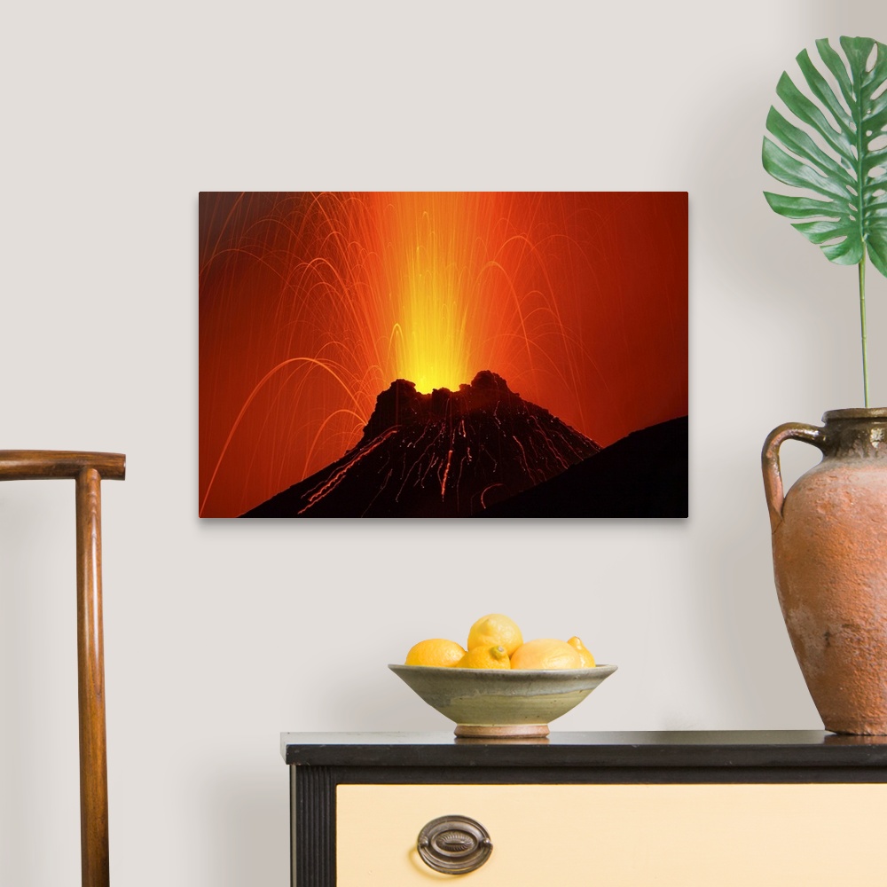 A traditional room featuring Photograph of an erupting volcano on the Aeolian Islands in Italy.
