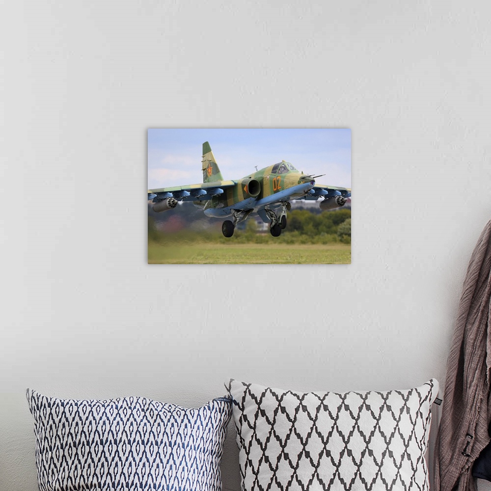 A bohemian room featuring Sukhoi Su-25 attack airplane of Kazakhstan Air Force taking off during Aviadarts 2019 exercise in...