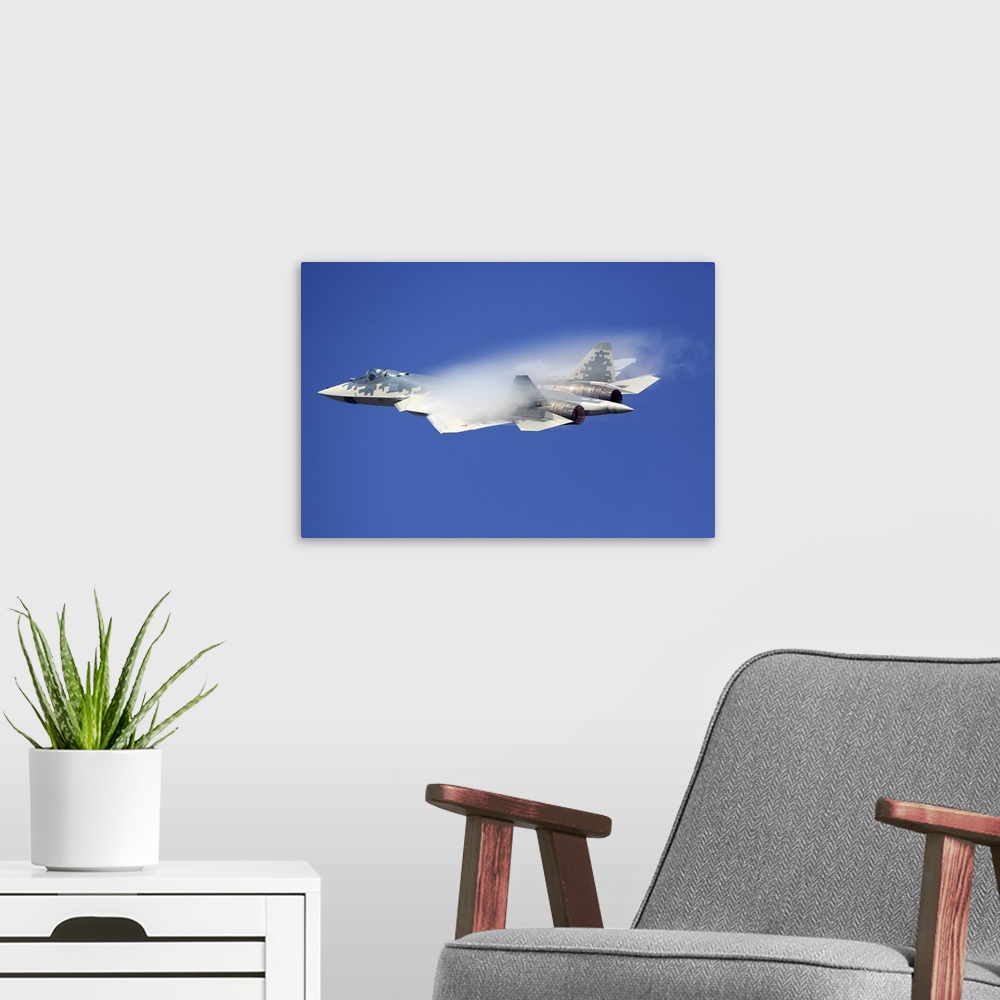 A modern room featuring Sukhoi Su-57 (T-50) jet fighter of the Russian Air Force performing demonstration flight at MAKS-...