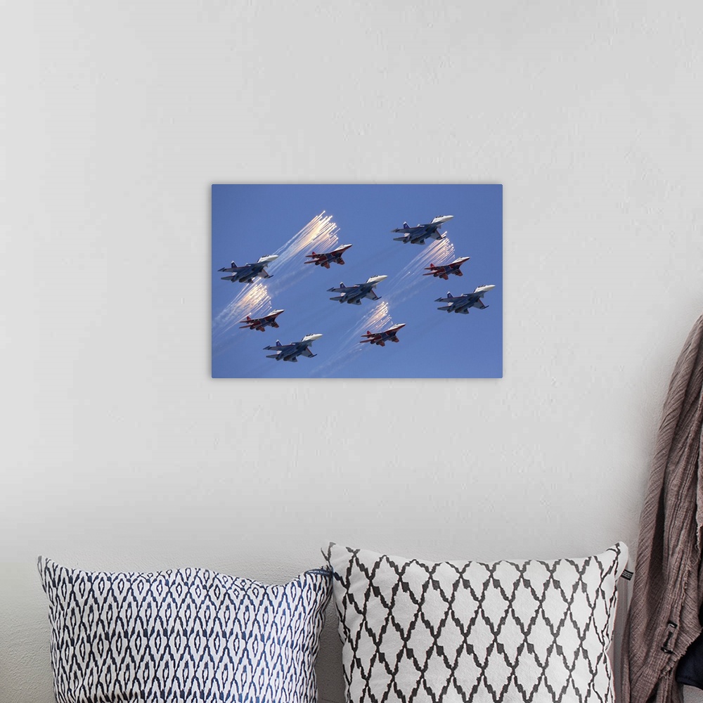 A bohemian room featuring Sukhoi Su-30SM jet fighters of the Russian Knights aerobatics team during parade rehearsal, Mosco...