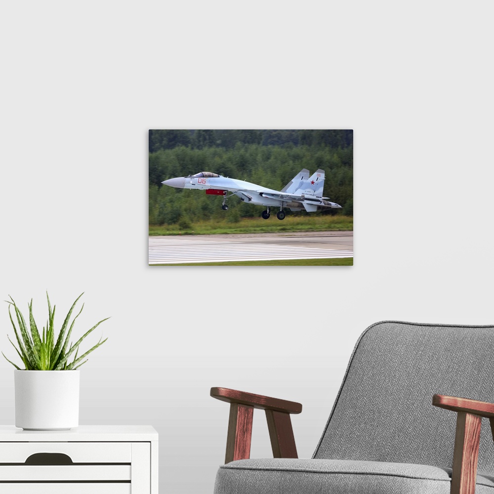 A modern room featuring Sukhoi Su-35S jet fighter of the Russian Air Force landing during ARMY-2017 military forum, Kubin...