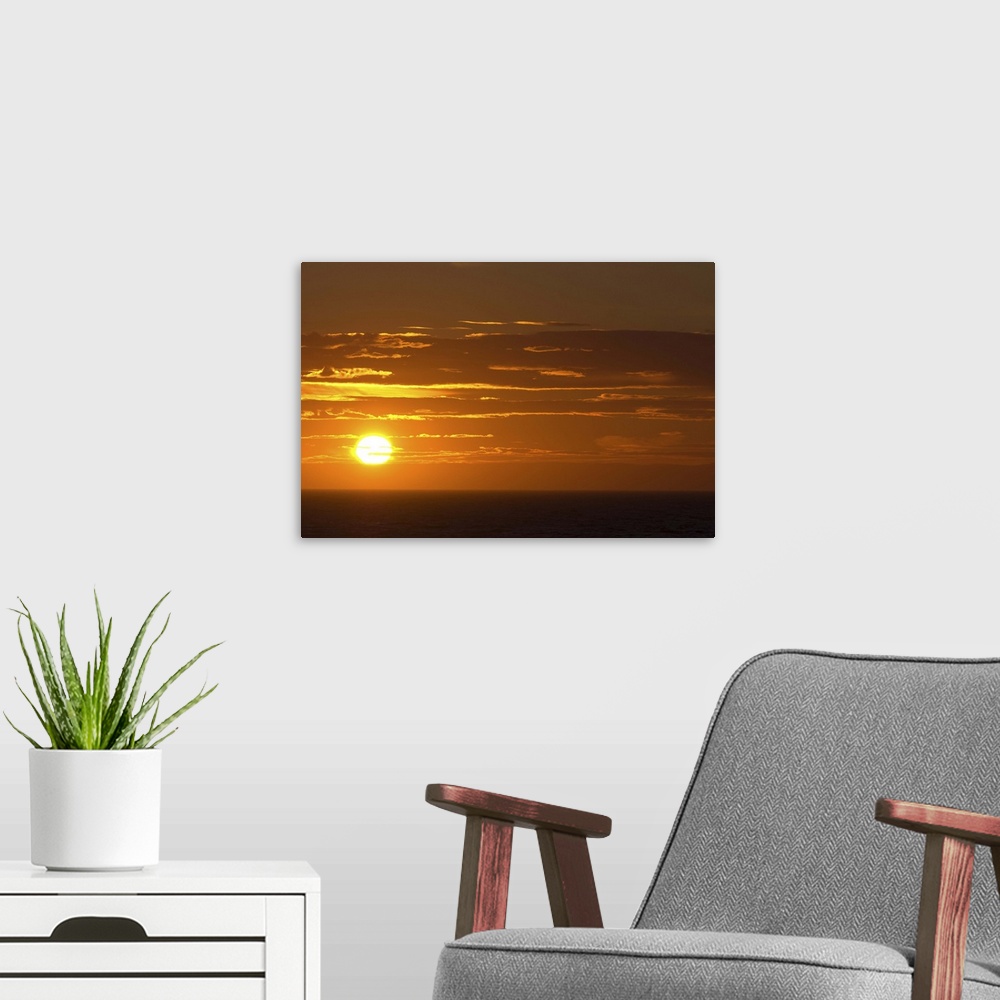 A modern room featuring Sunset at Gulf of St Lawrence