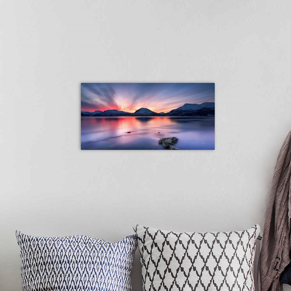 A bohemian room featuring Sunset over Tjeldsundet, Troms County, Norway. Saetertinden and Harberget Mountains are visible i...