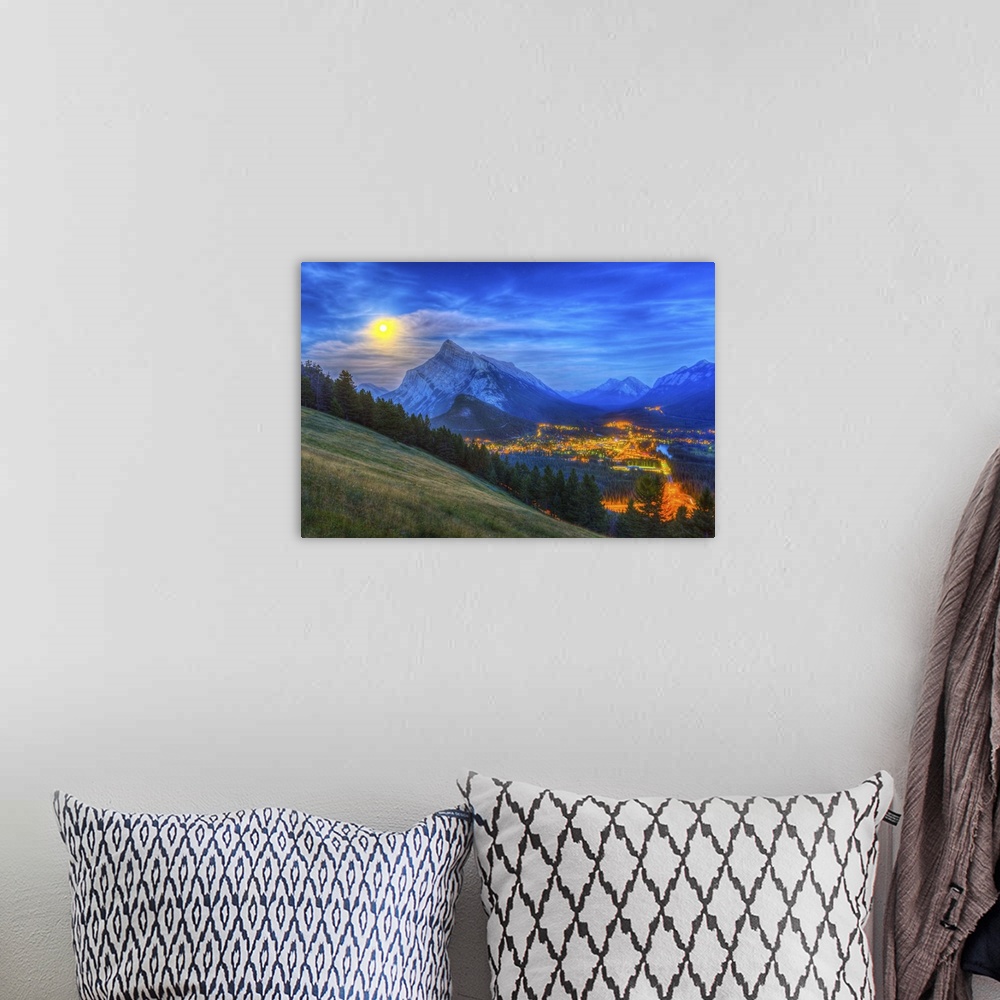 A bohemian room featuring August 10, 2014 - High dynamic range photo of the supermoon rising behind Mt. Rundle and Banff to...