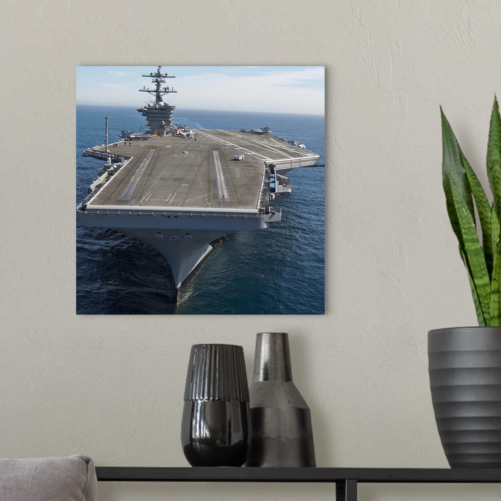 A modern room featuring Pacific Ocean, February 15, 2013 - The aircraft carrier USS Carl Vinson is underway conducting Pr...