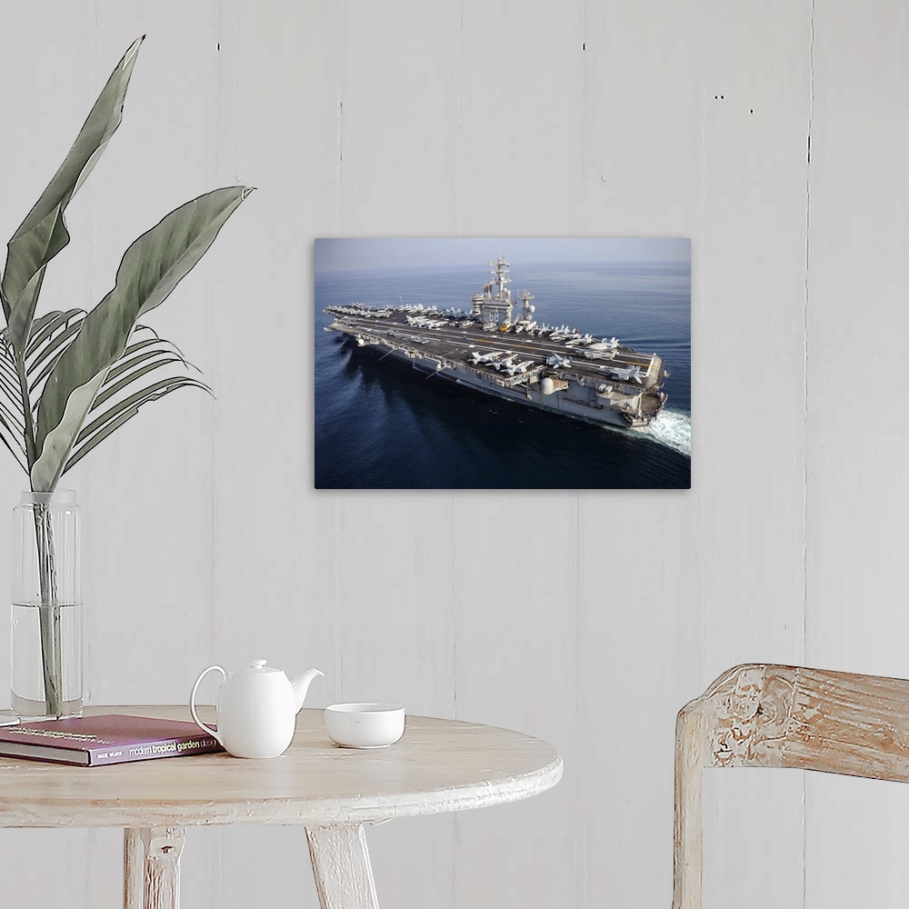A farmhouse room featuring Arabian Gulf, August 13, 2013 - The aircraft carrier USS Nimitz (CVN-68) is underway in the Arabi...