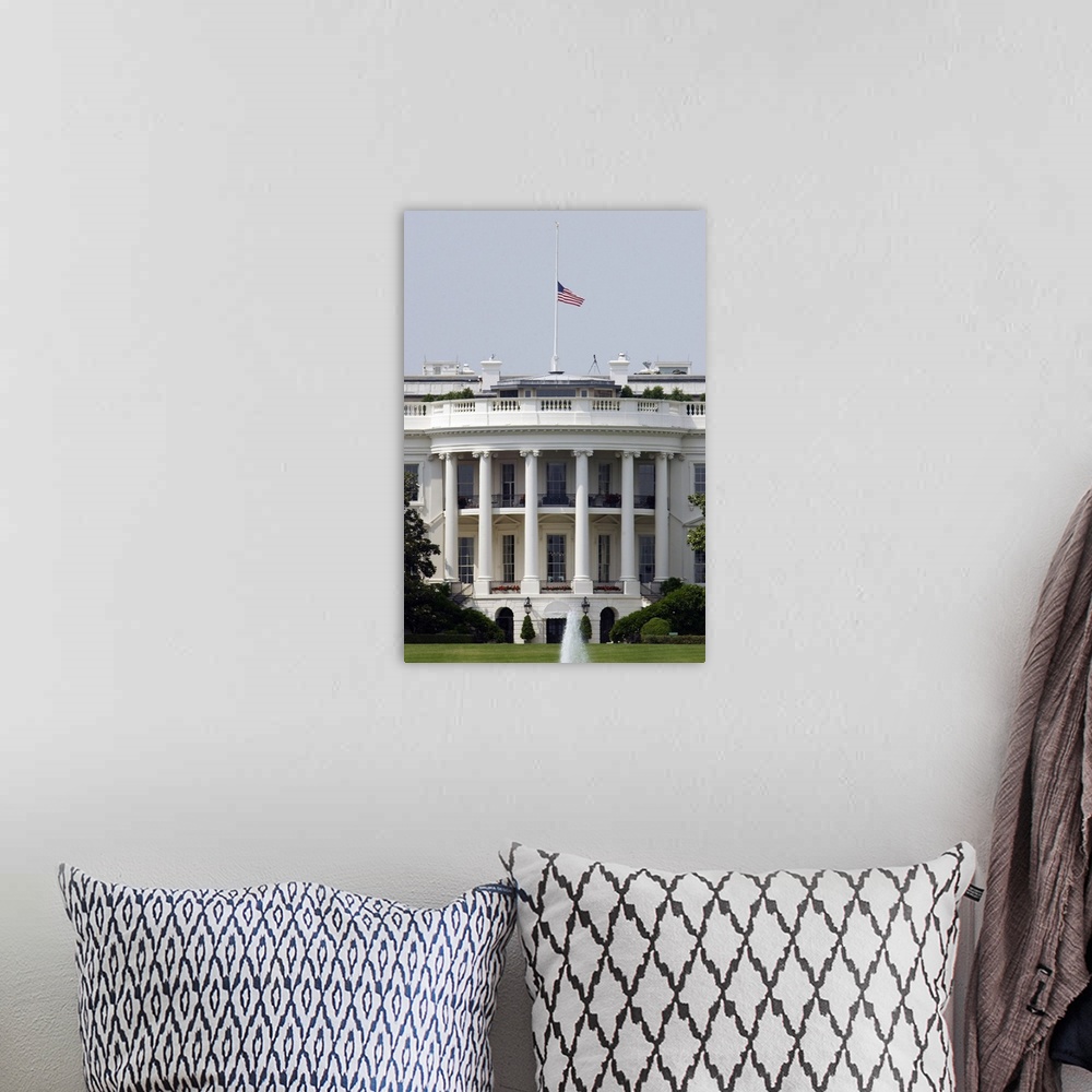 A bohemian room featuring The American flag flies at half-staff atop the White House.
