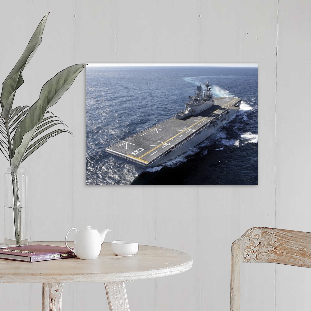 A farmhouse room featuring The amphibious assault ship USS Makin Island in the Gulf of Mexico.
