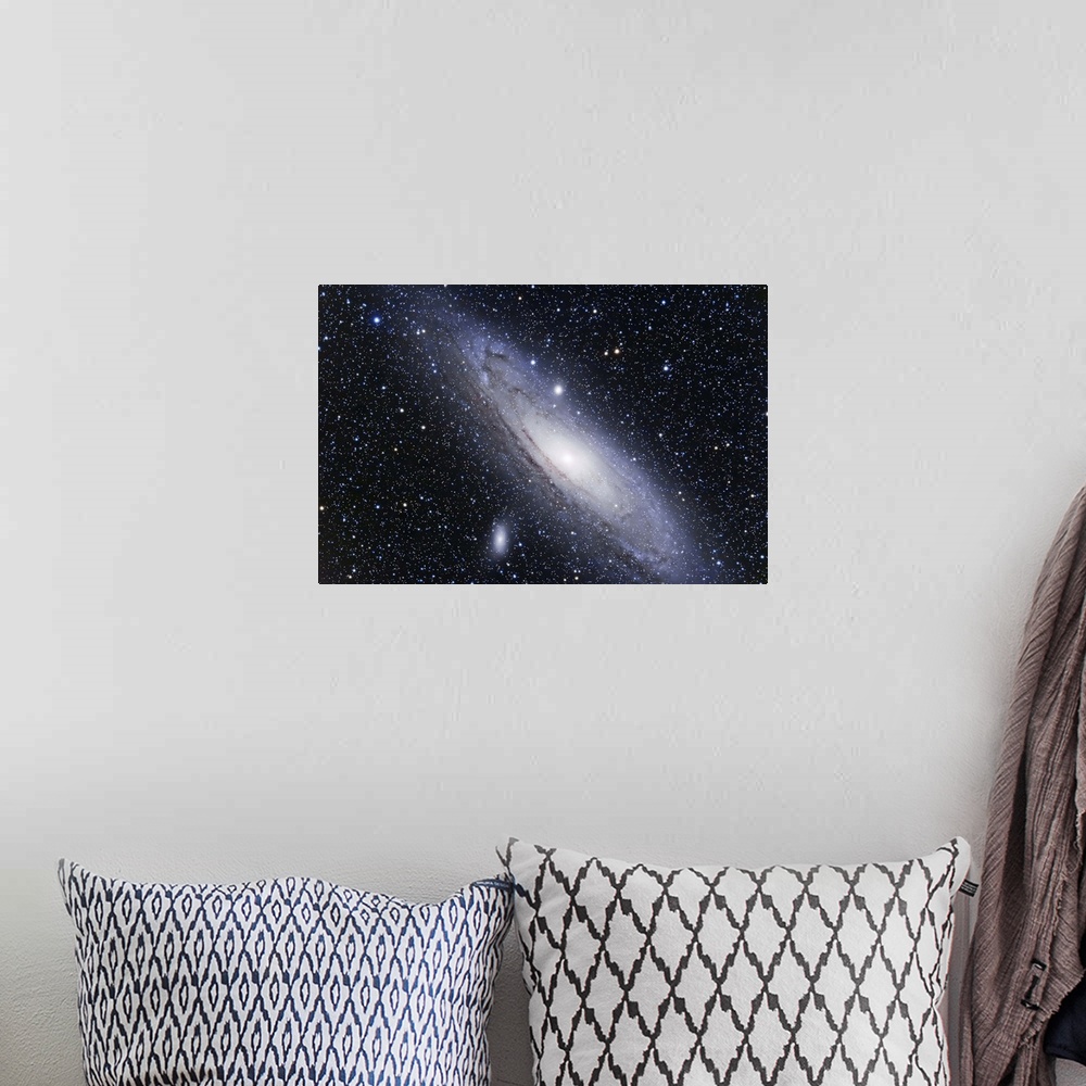 A bohemian room featuring The Andromeda Galaxy, a spiral galaxy in the Andromeda constellation.