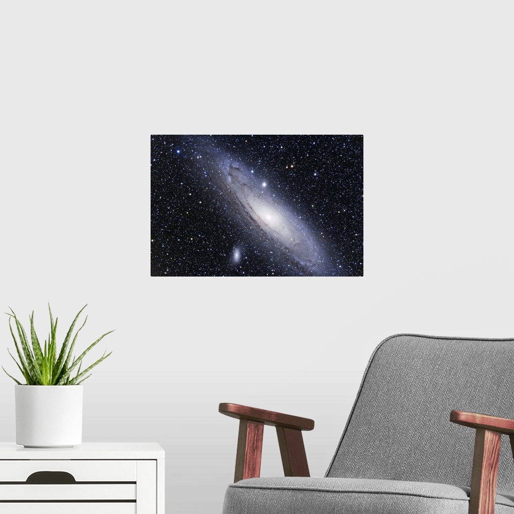 A modern room featuring The Andromeda Galaxy, a spiral galaxy in the Andromeda constellation.