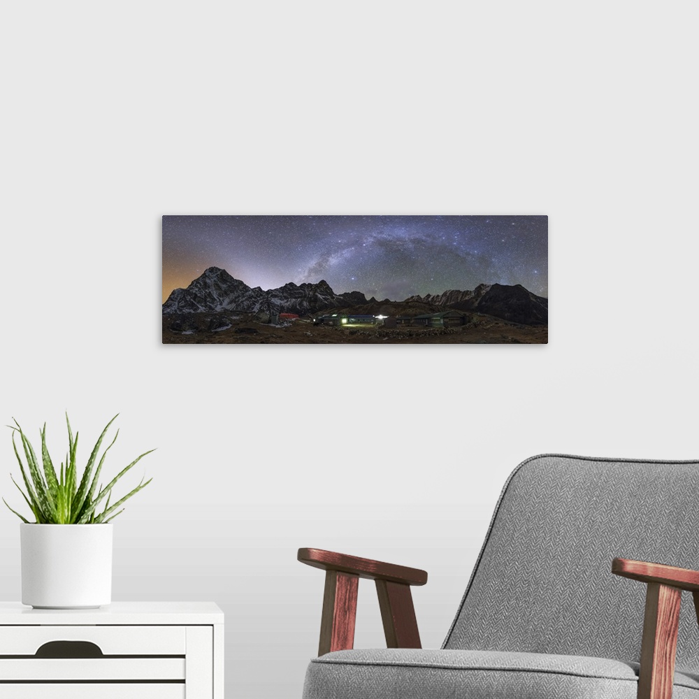A modern room featuring The arch of the Milky Way galaxy and bright zodiacal light band appear over this 360 degree view ...