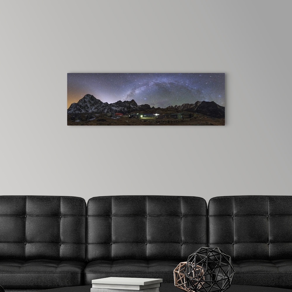 A modern room featuring The arch of the Milky Way galaxy and bright zodiacal light band appear over this 360 degree view ...
