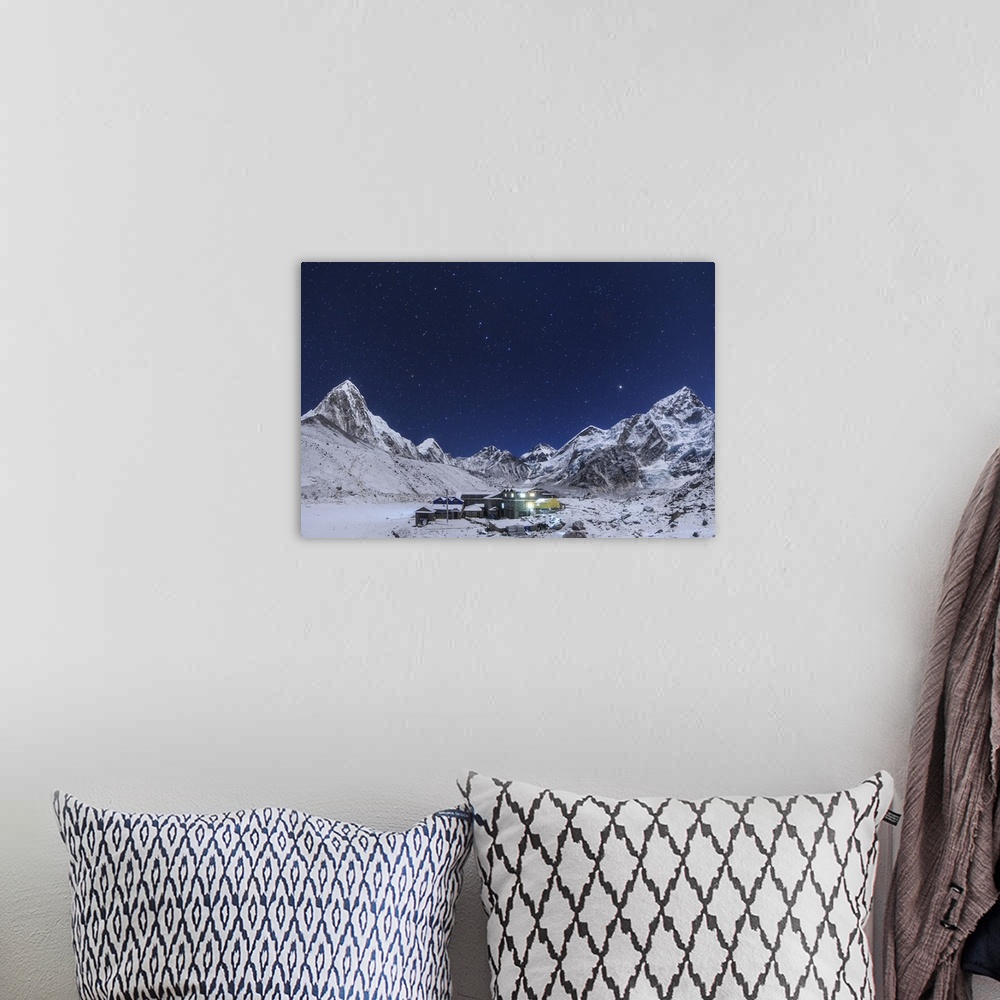 A bohemian room featuring In this moonlight night, the Big Dipper rise above the Himalayas and the Gorak Shep settlement. T...