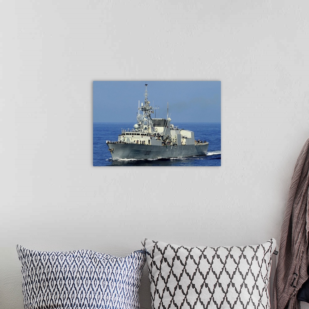 A bohemian room featuring The Canadian patrol frigate HMCS Halifax.