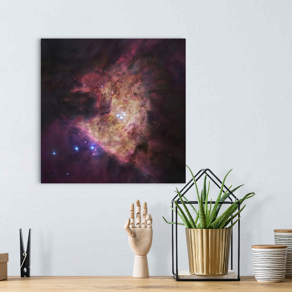 A bohemian room featuring The center of the Orion Nebula (Messir 42), known as the Trapezium Cluster.  Directly in front of...