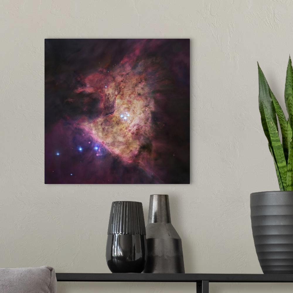 A modern room featuring The center of the Orion Nebula (Messir 42), known as the Trapezium Cluster.  Directly in front of...