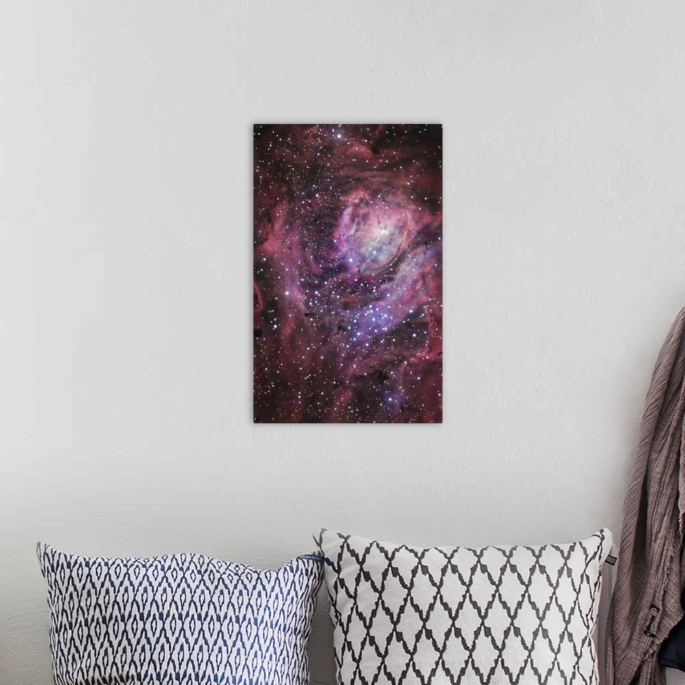 A bohemian room featuring The central region of the Lagoon Nebula, which is also known as Messier 8, in the constellation o...