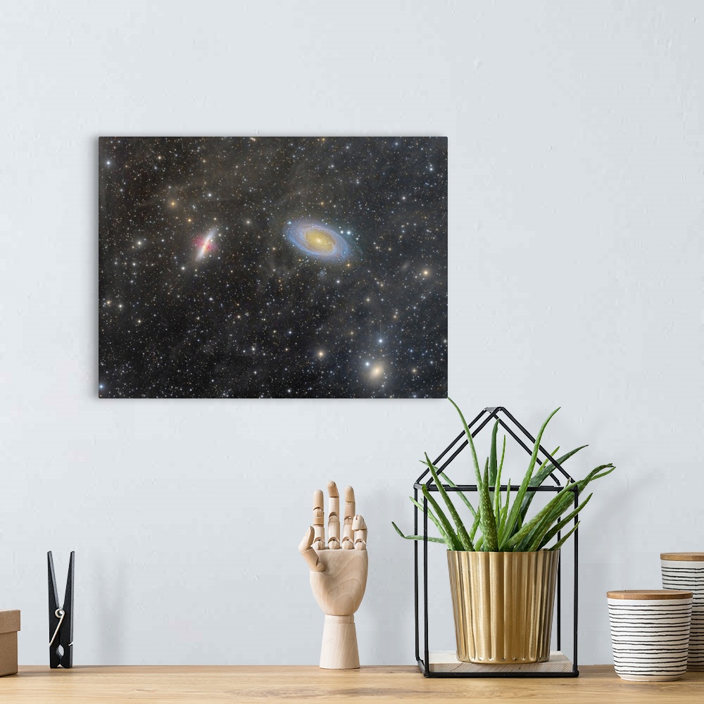 A bohemian room featuring The Cigar Galaxy and Bode's Galaxy.