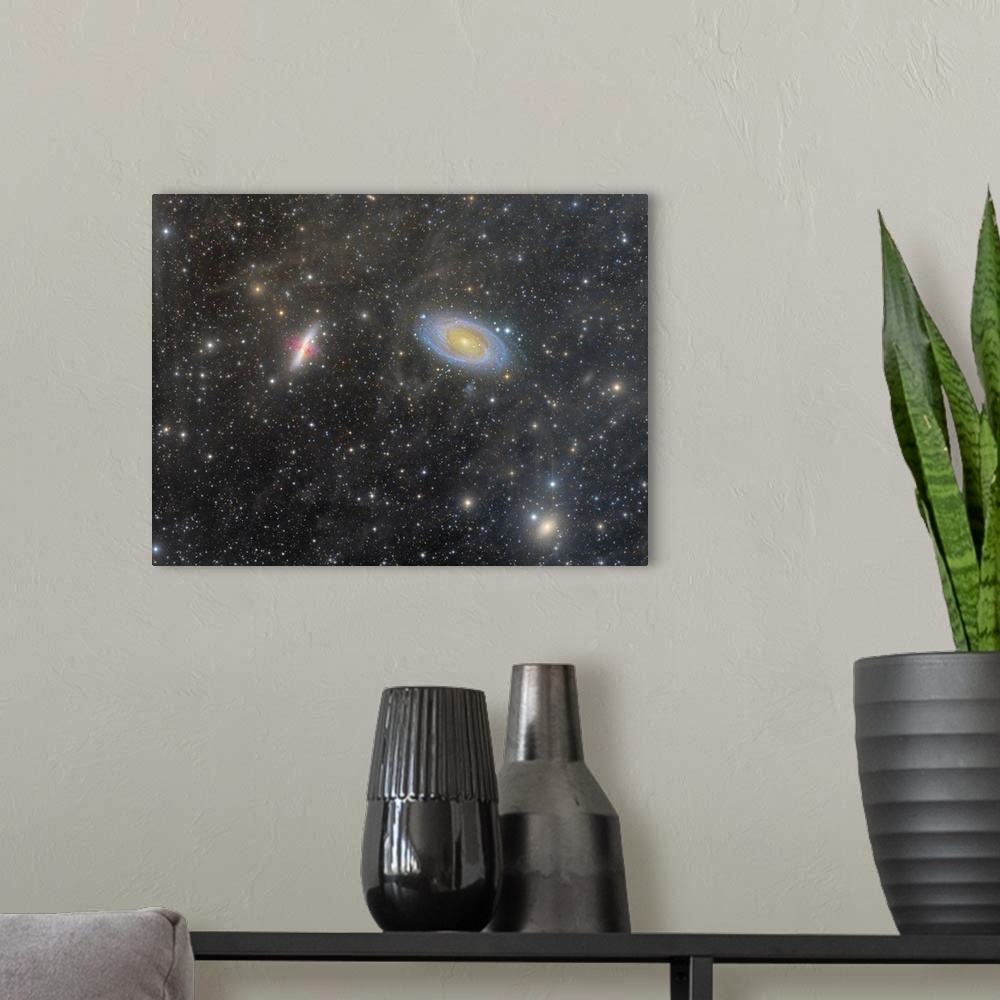 A modern room featuring The Cigar Galaxy and Bode's Galaxy.