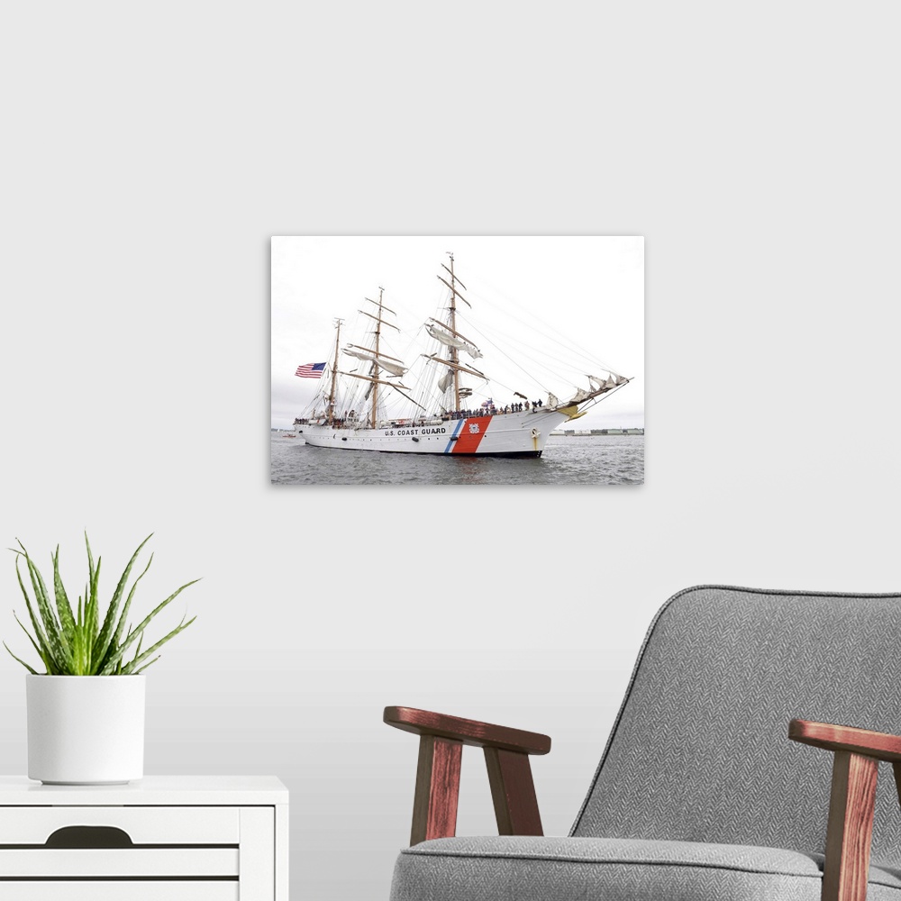 A modern room featuring The Coast Guard Cutter Eagle is preparing to moor in Portland Harbor, Maine.