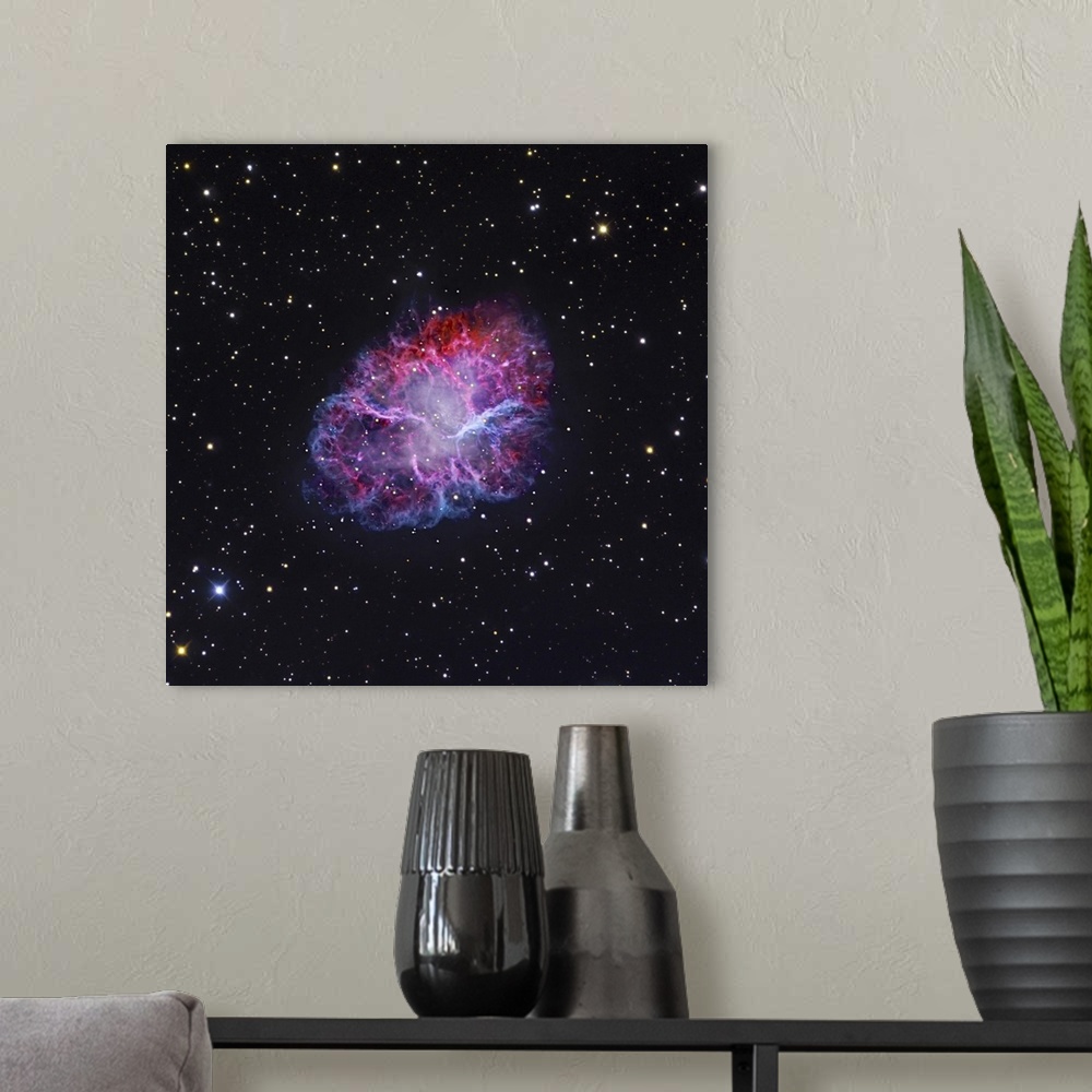 A modern room featuring The Crab Nebula. The Crab supernova remnant represents the remains of a shattered supergiant star...