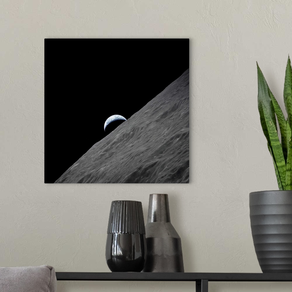 A modern room featuring The crescent Earth rises above the lunar horizon