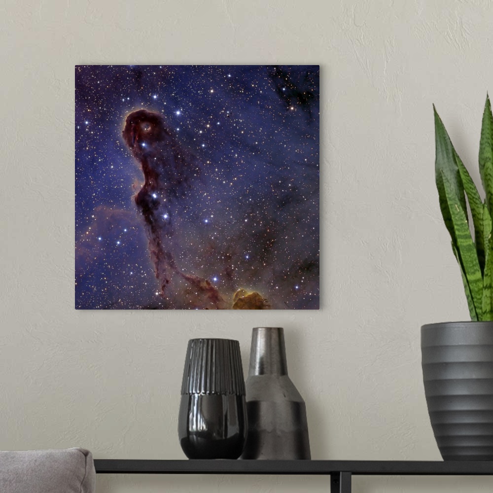 A modern room featuring The Elephants Trunk Nebula in the star cluster IC 1396