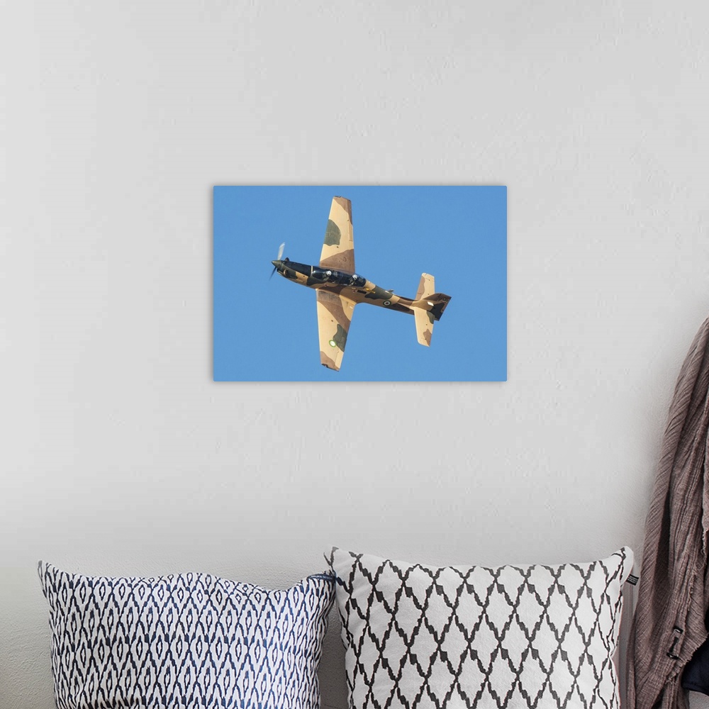 A bohemian room featuring The Embraer EMB 312 Tucano used by the Islamic Revolutionary Guard Corps.
