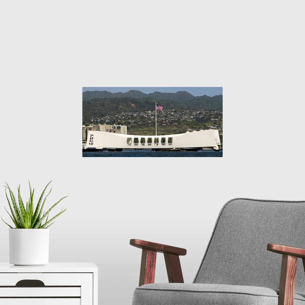 A modern room featuring The Ensign flies over the Arizona Memorial