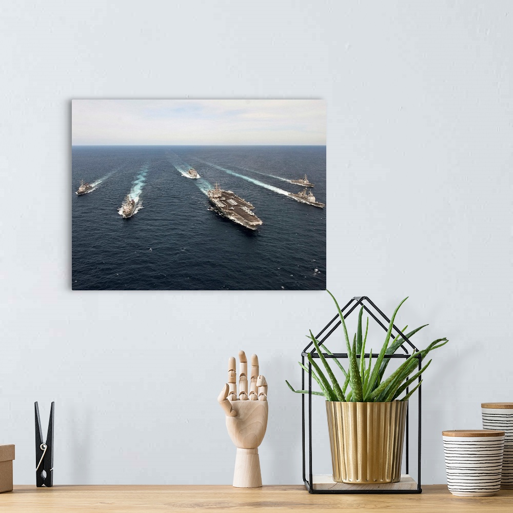 A bohemian room featuring The Enterprise Carrier Strike Group transits the Atlantic Ocean.