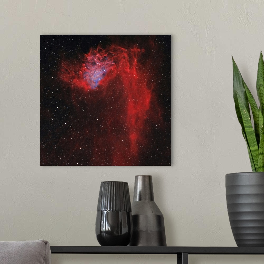 A modern room featuring The Flaming Star Nebula, also known as IC 405.