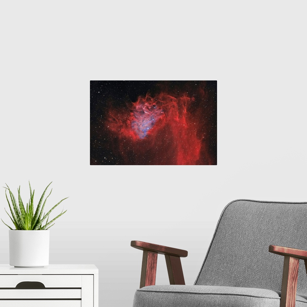 A modern room featuring The Flaming Star Nebula, also known as IC 405.