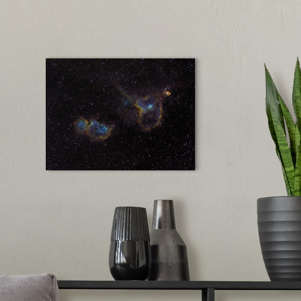 A modern room featuring The Heart and Soul Nebulae