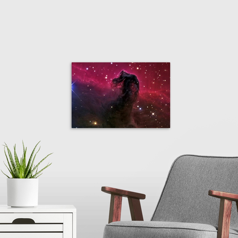 A modern room featuring Photograph of interstellar cloud of dust, hydrogen, helium, and other gases with stars sprinkled ...